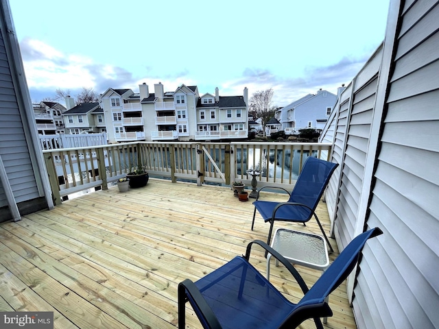 deck featuring a water view