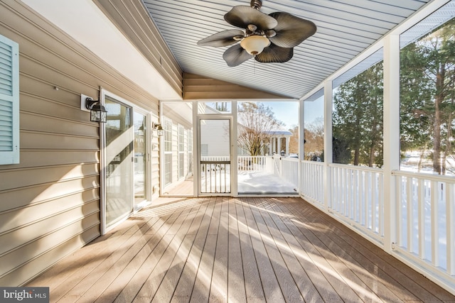 wooden terrace featuring ceiling fan