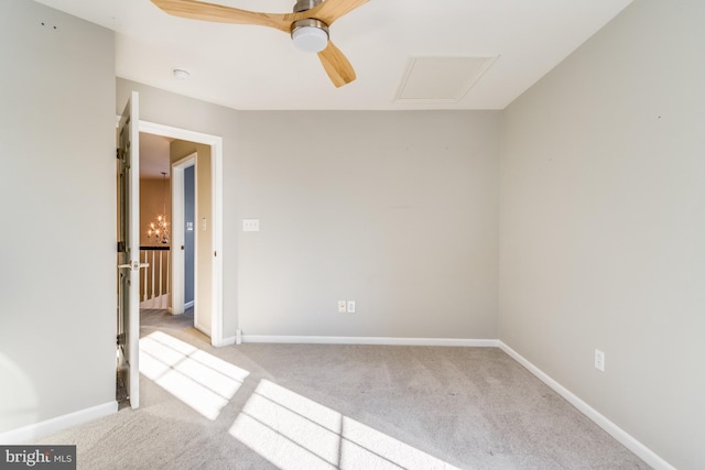 carpeted empty room with ceiling fan