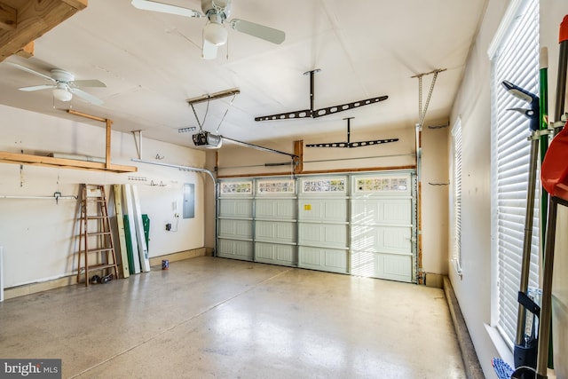 garage featuring a garage door opener and electric panel