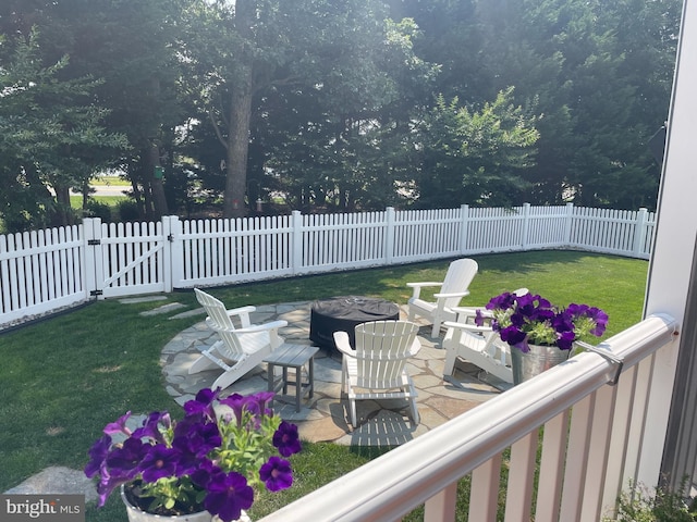 view of yard featuring a patio area and a fire pit