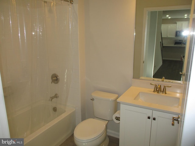 full bathroom with shower / tub combo, vanity, and toilet