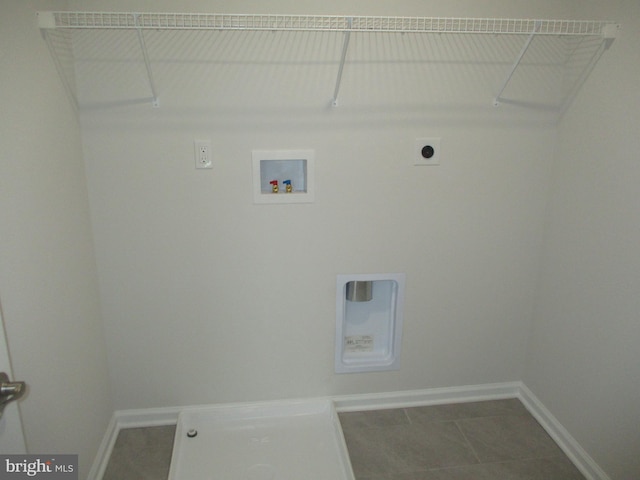 laundry area with washer hookup, tile patterned floors, and electric dryer hookup