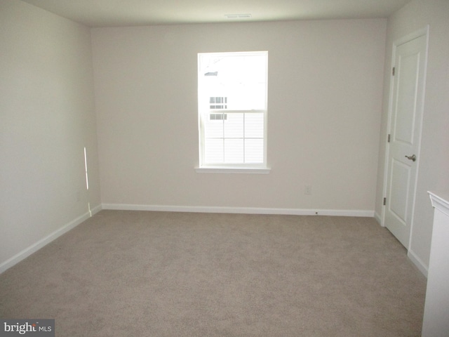 view of carpeted spare room