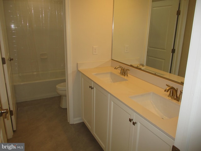 full bathroom featuring tile patterned flooring, vanity, toilet, and shower / bathtub combination