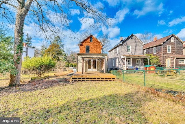 view of yard featuring a storage shed and a deck