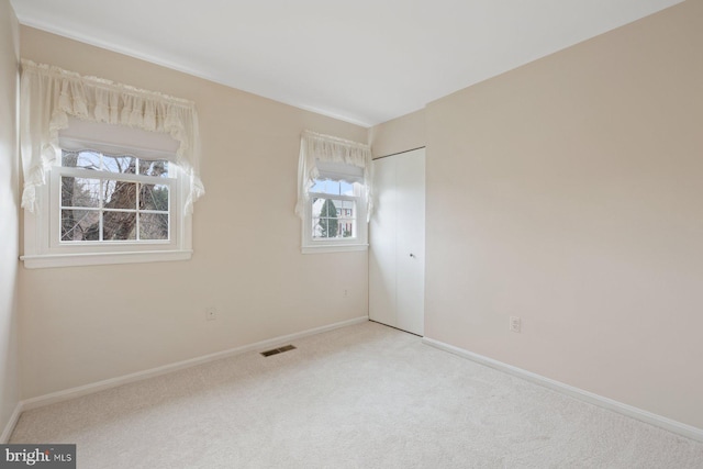 view of carpeted spare room