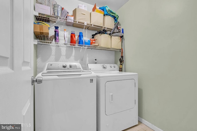 laundry area with washer and clothes dryer