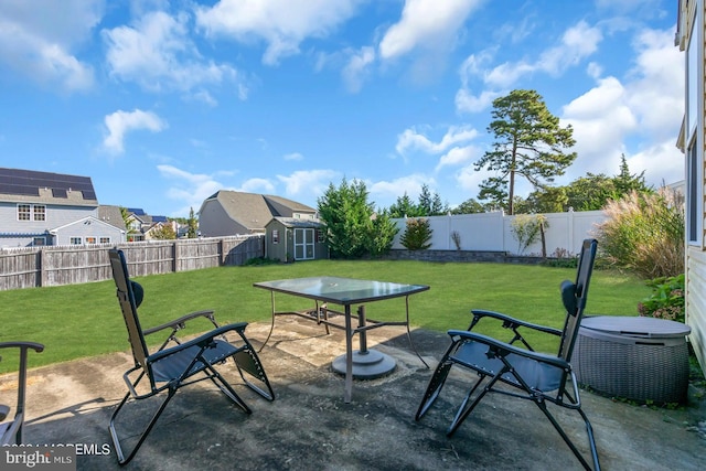 view of patio featuring central AC unit and a storage unit