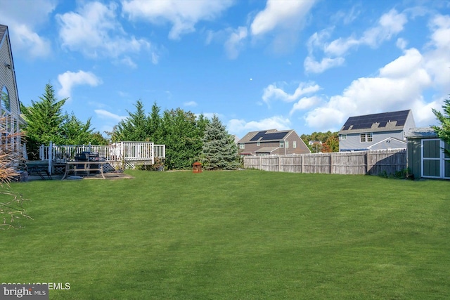 view of yard featuring a deck