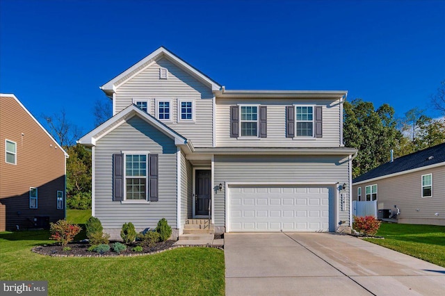 front of property with a front yard and a garage