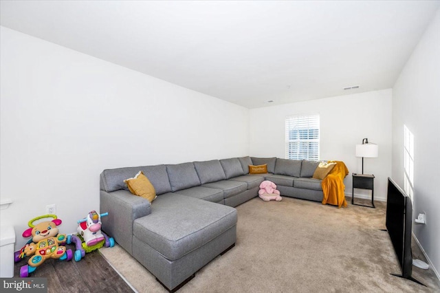 living room featuring carpet