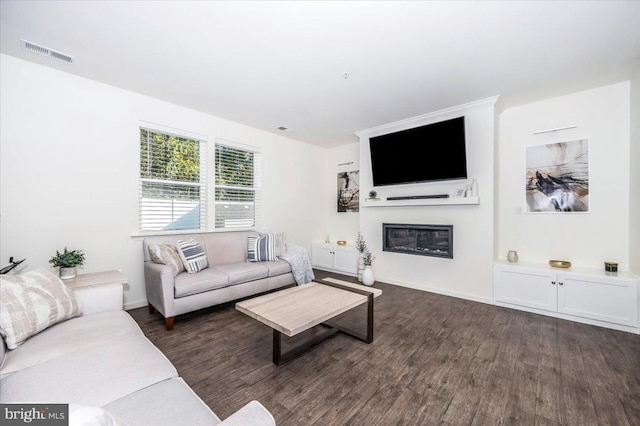 living room featuring dark hardwood / wood-style floors