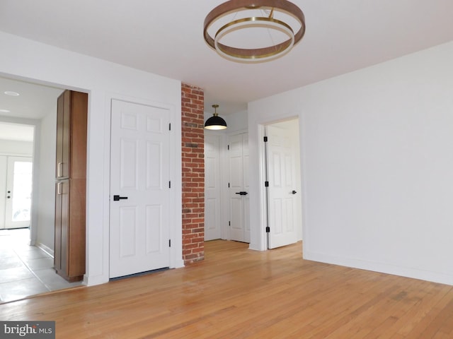 unfurnished bedroom featuring light hardwood / wood-style floors