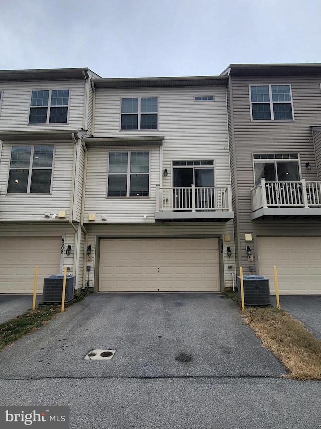 view of front of property featuring cooling unit