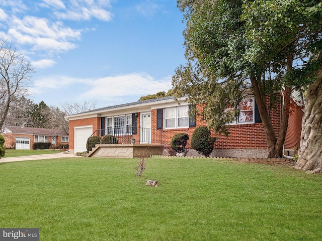 single story home featuring a front yard and a garage