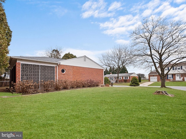 view of yard with a garage