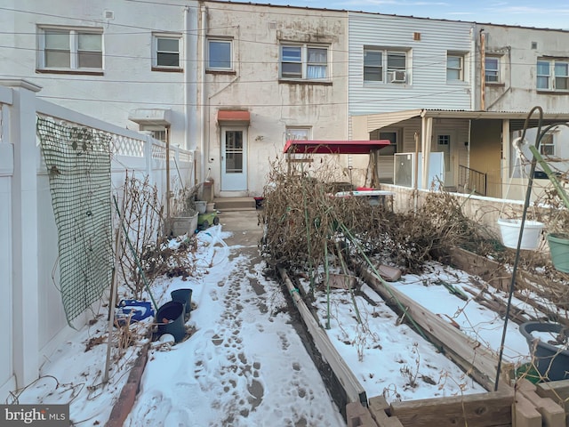 view of front of home with cooling unit