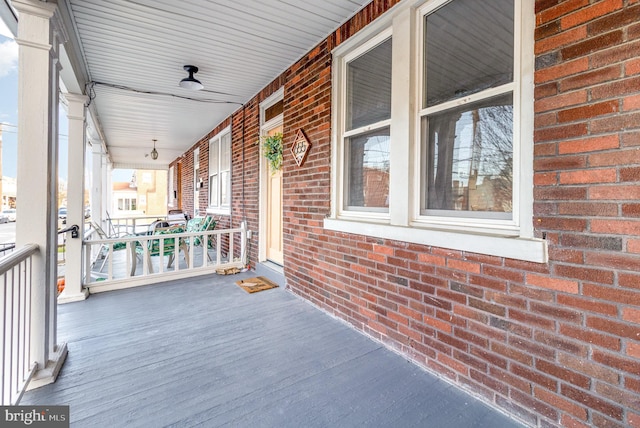 exterior space featuring ceiling fan and covered porch