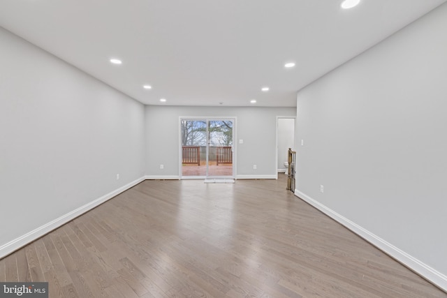 unfurnished living room featuring light wood-type flooring