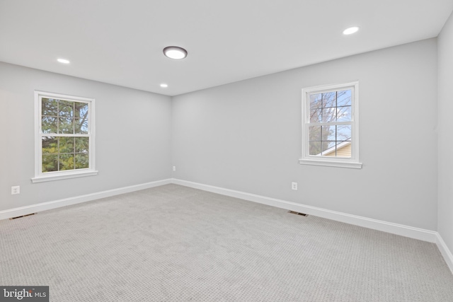 unfurnished room with carpet floors