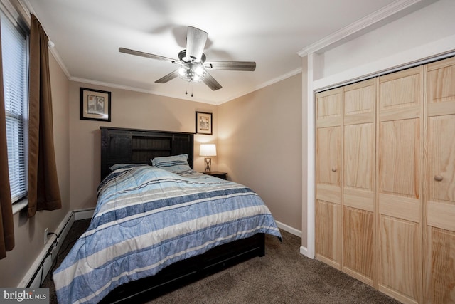 carpeted bedroom with a closet, baseboards, ornamental molding, and a ceiling fan