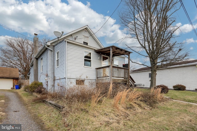 view of front of property with a chimney