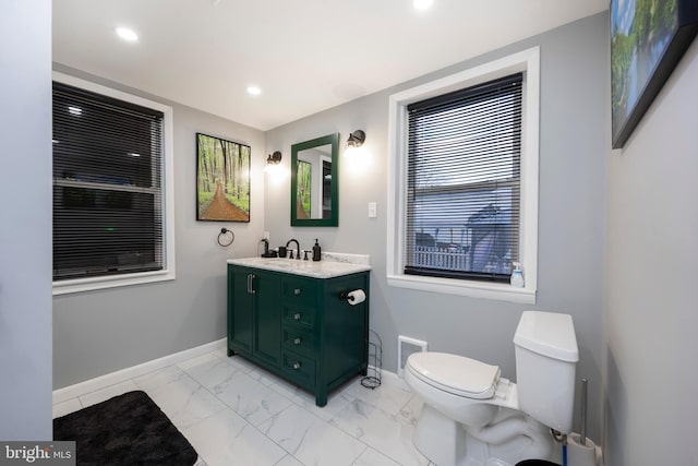 bathroom with visible vents, baseboards, toilet, recessed lighting, and marble finish floor