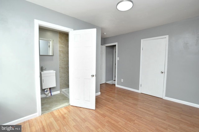 unfurnished bedroom featuring light hardwood / wood-style flooring