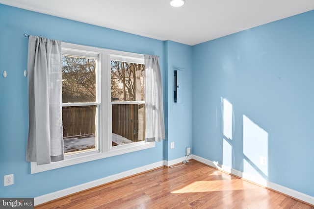 empty room featuring hardwood / wood-style floors