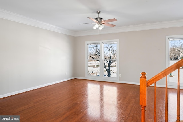 unfurnished room with ceiling fan, crown molding, and wood-type flooring