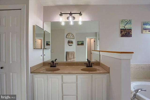 bathroom with a bathtub and vanity