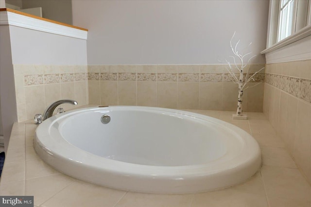 bathroom featuring a tub