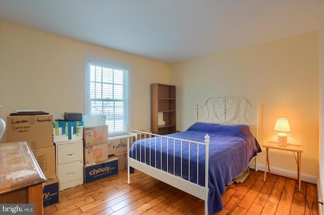 bedroom with light hardwood / wood-style flooring