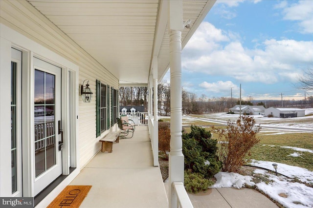 view of snow covered patio