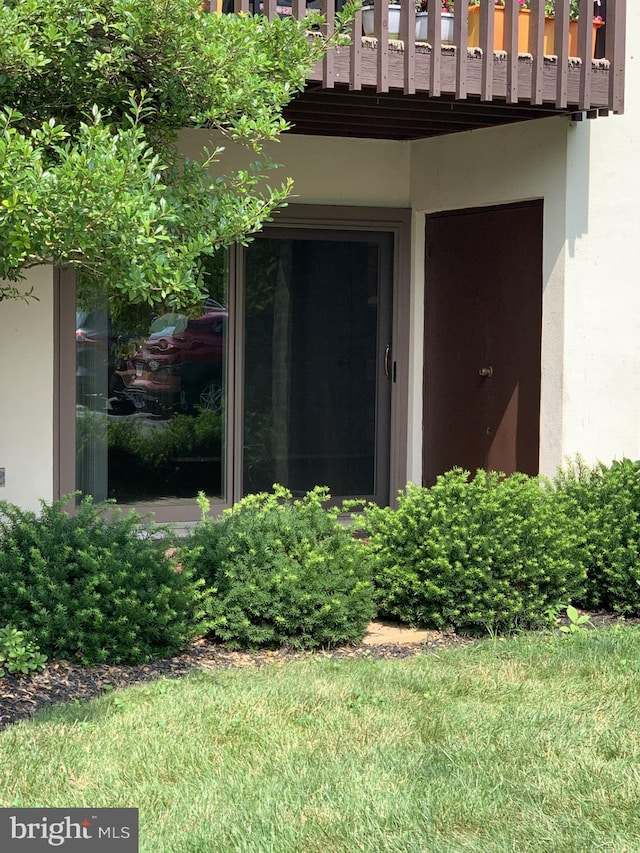 property entrance with a balcony