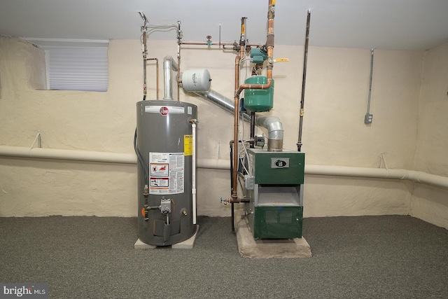 utility room featuring water heater