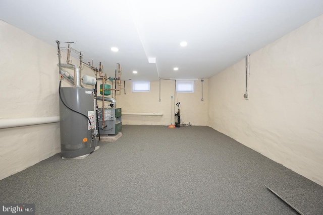 basement with carpet and gas water heater