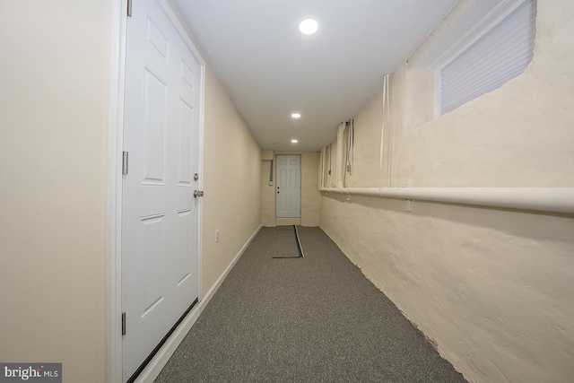 corridor featuring carpet floors