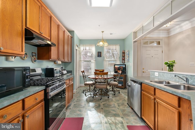 kitchen with crown molding, sink, appliances with stainless steel finishes, decorative light fixtures, and a chandelier