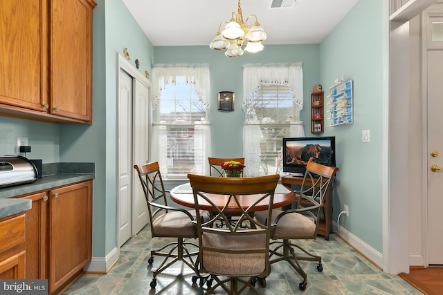 dining area with a chandelier