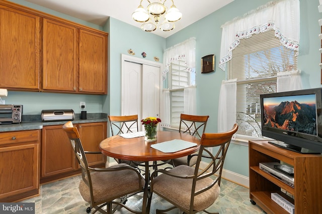 dining area with a chandelier