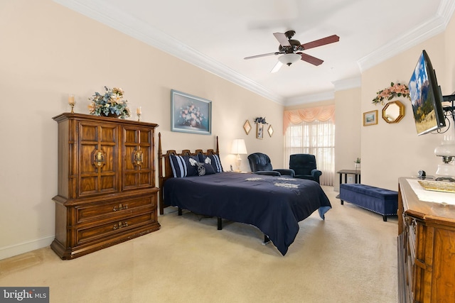 carpeted bedroom featuring ceiling fan and ornamental molding