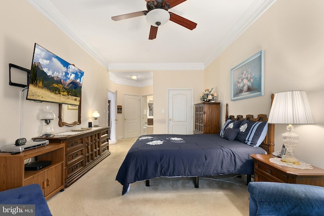 bedroom with light colored carpet, ceiling fan, and crown molding