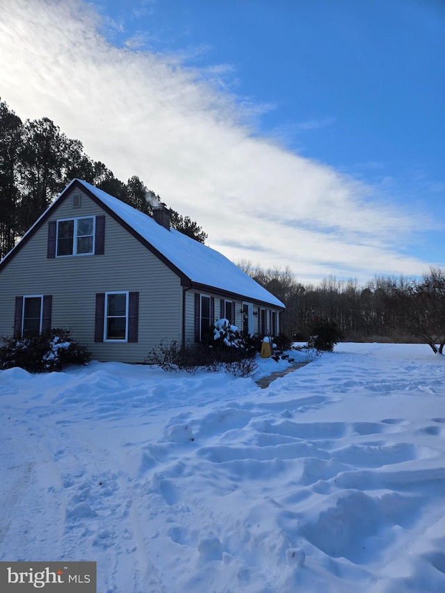 view of snow covered property