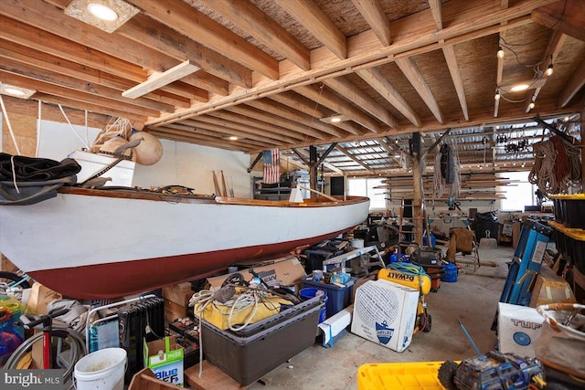 basement with a workshop area and a healthy amount of sunlight