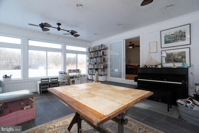 tiled dining space with crown molding