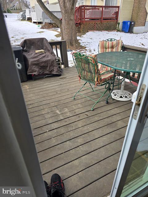 view of snow covered deck