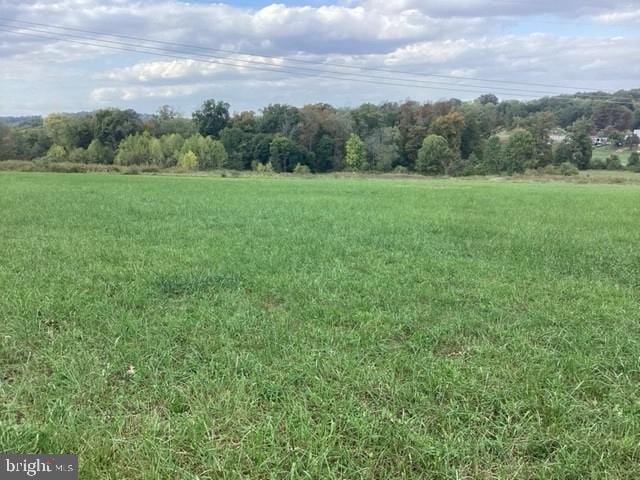 view of landscape featuring a rural view