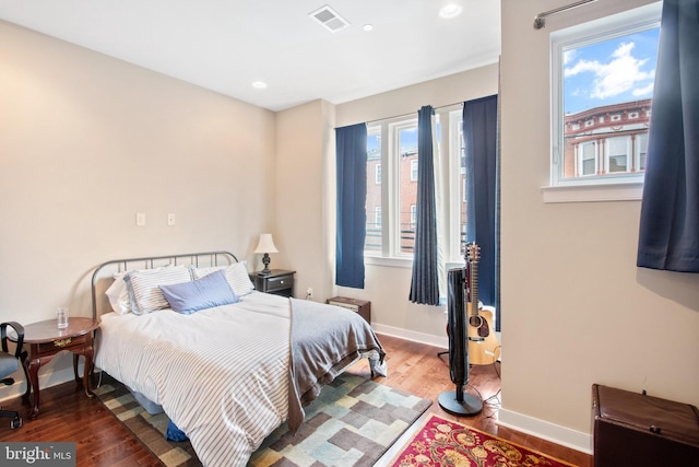 bedroom featuring dark hardwood / wood-style floors